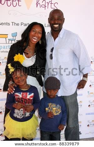 alimi ballard parents.